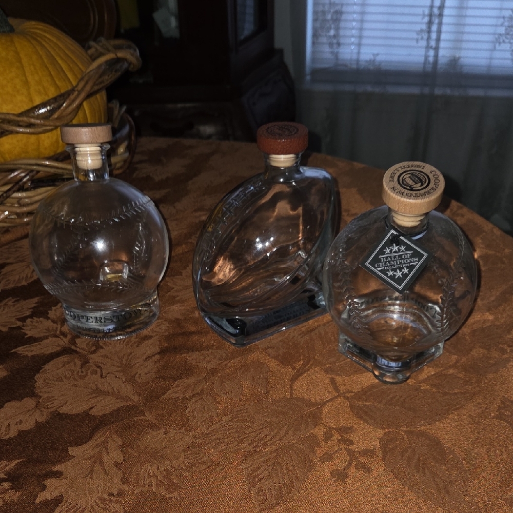 Set of Three Cooperstown Distellery Clear Glass Bottles with Wooden Stoppers